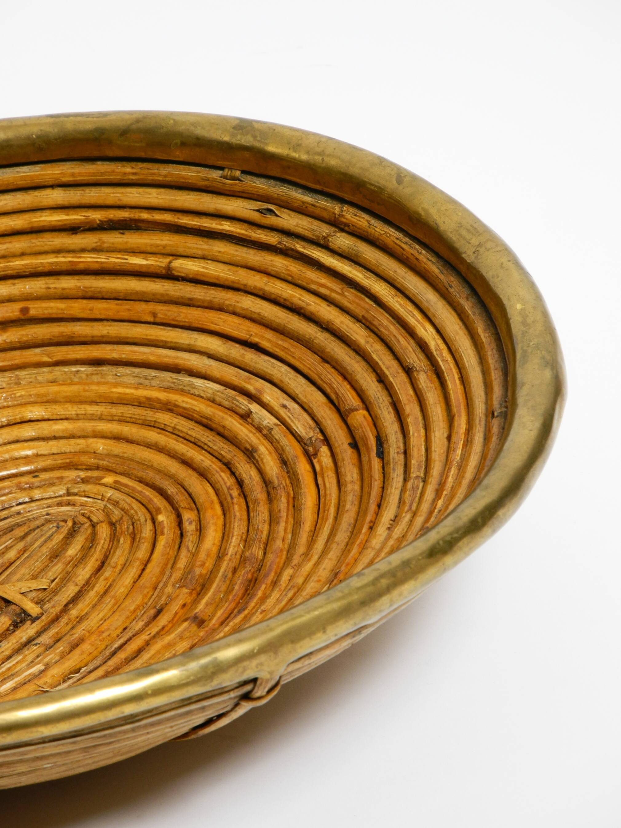 A pair of beautiful Italian Mid Century Modern bamboo bowls with brass rims