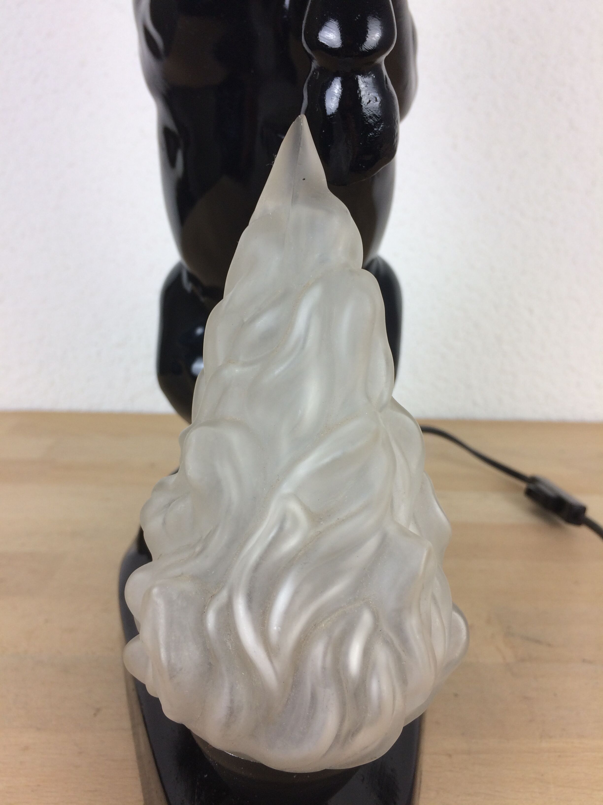 Prancing horse lamp and flame