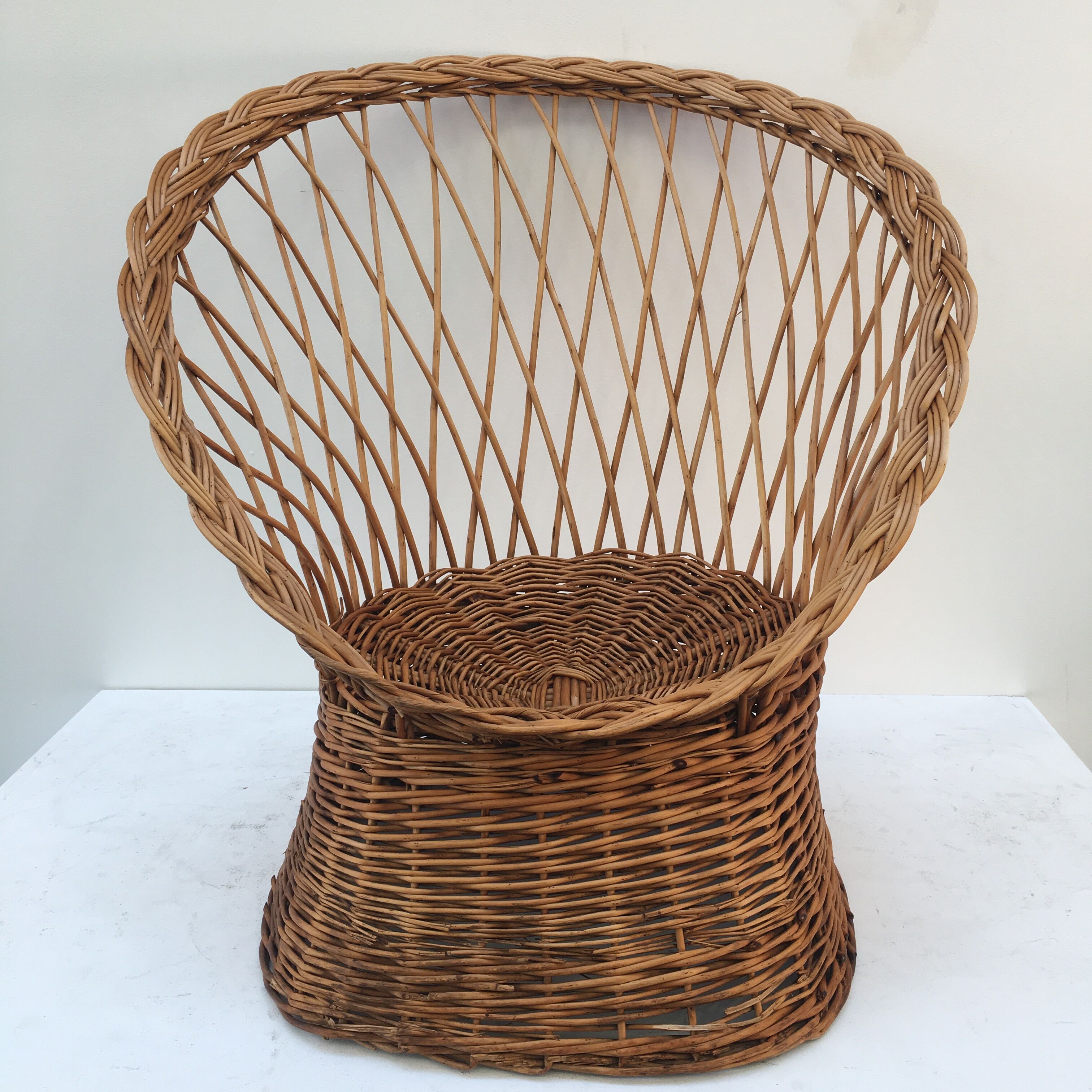 Braided wicker throne armchair