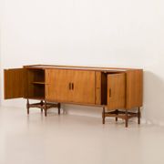 Itaian mid century teak sideboard with black glass top and inlays, 1970s