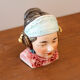 Tobacco pot woman's head in folk headdress
