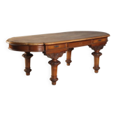 Antique walnut table with drawers, Italy, 19th century.