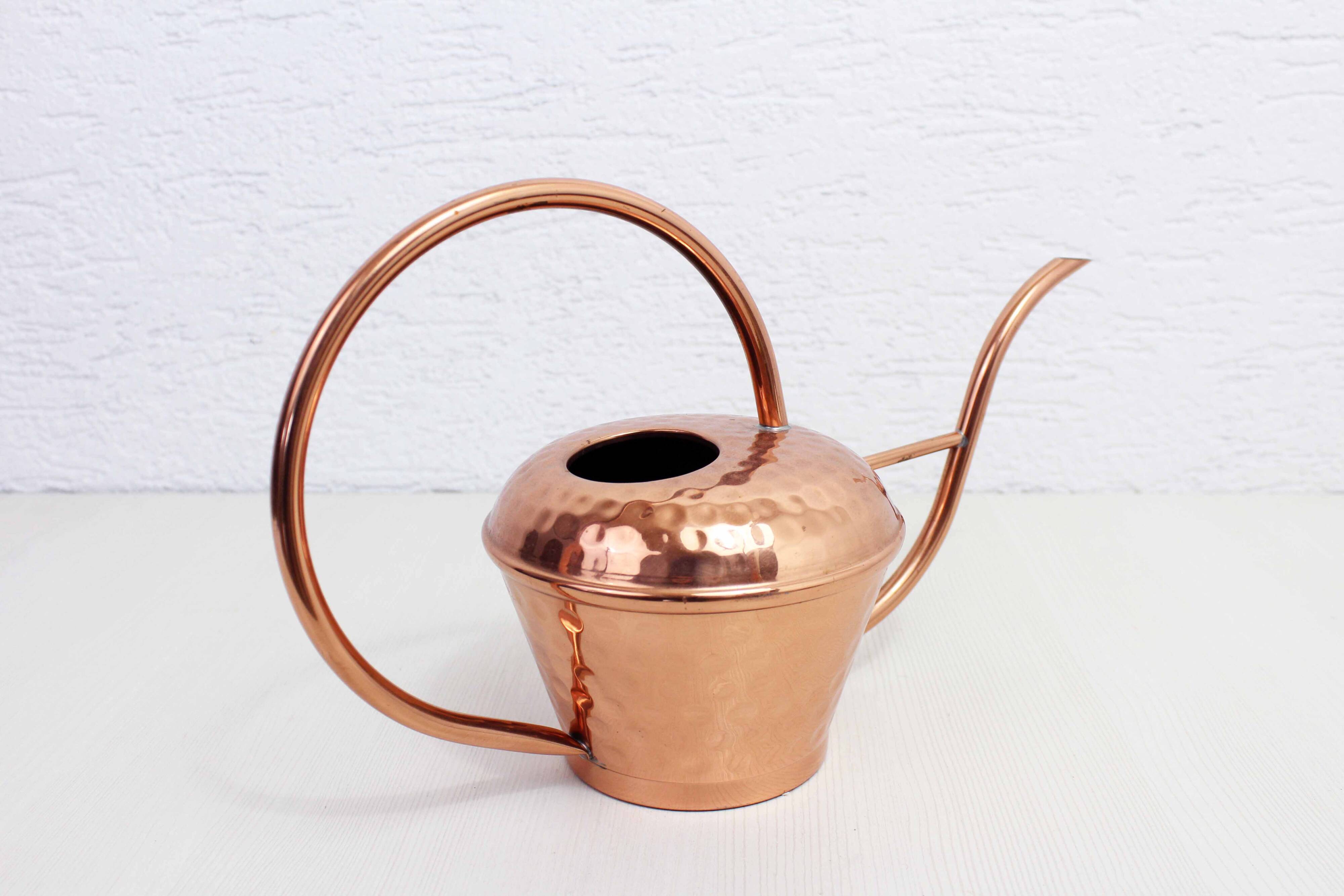 Vintage copper watering can