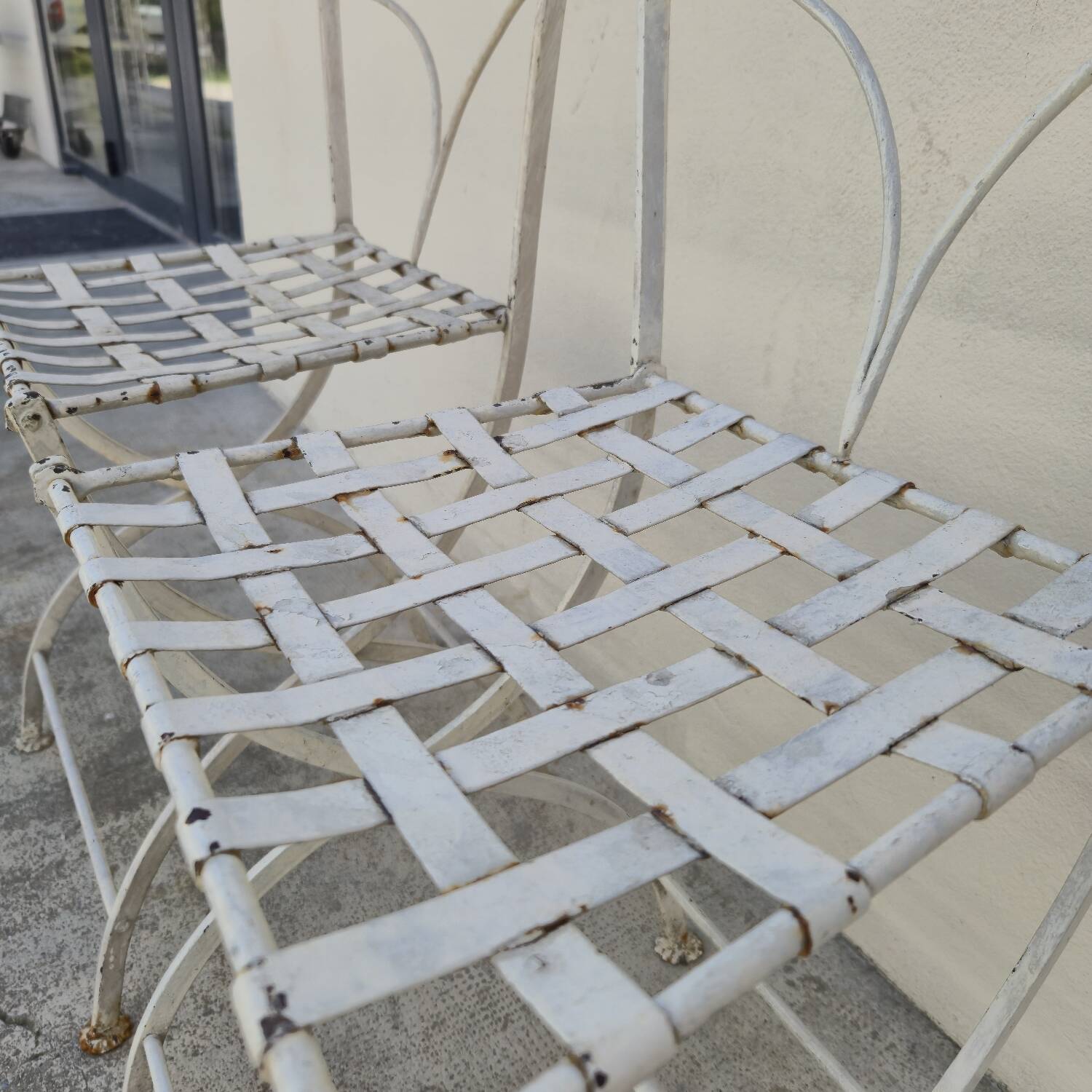 Pair of 19th century wrought iron garden chairs