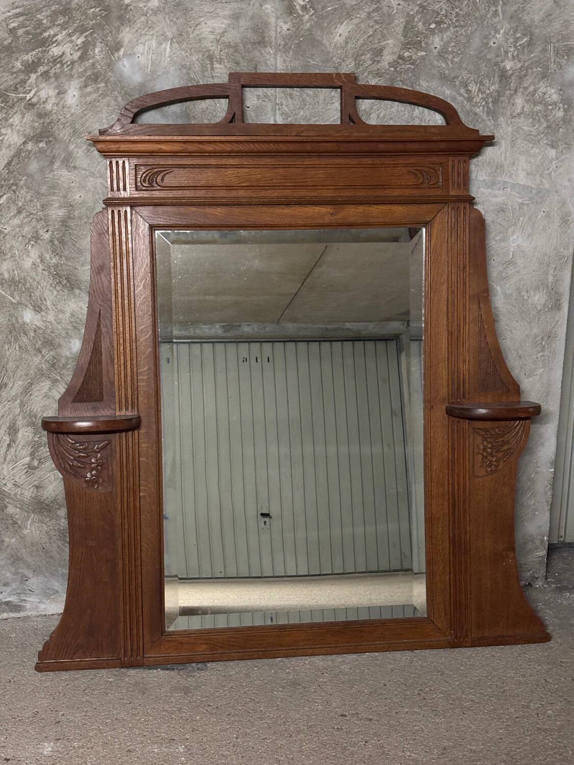 Molded and carved wooden trumeau