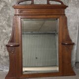 Molded and carved wooden trumeau