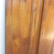 Pair of antique cherry wood cabinet doors from the 19th century in their original part