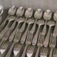 Silver metal housewife signed Christofle spoons and forks