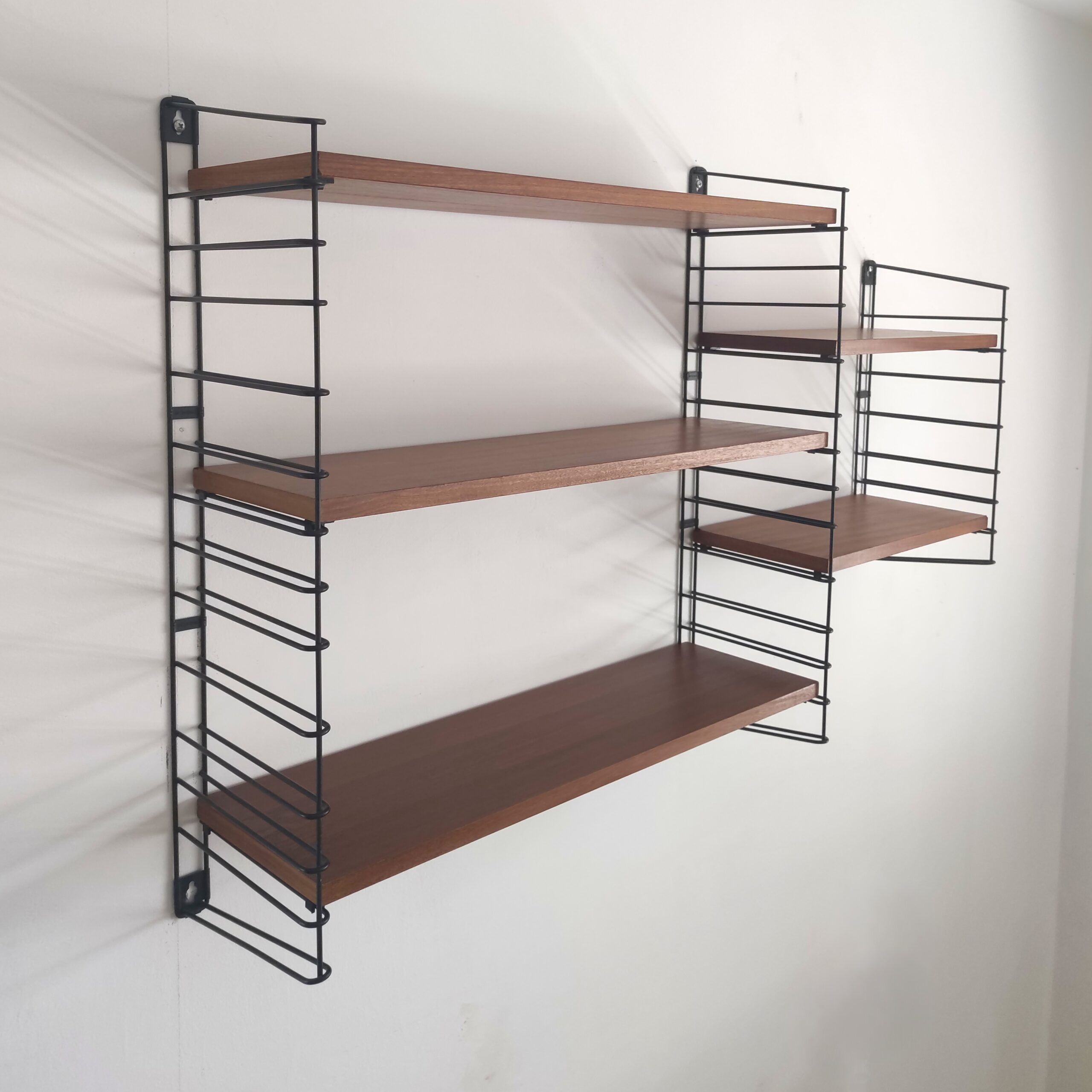 Tomado wall unit with wooden shelves by A. Dekker – Tomado
