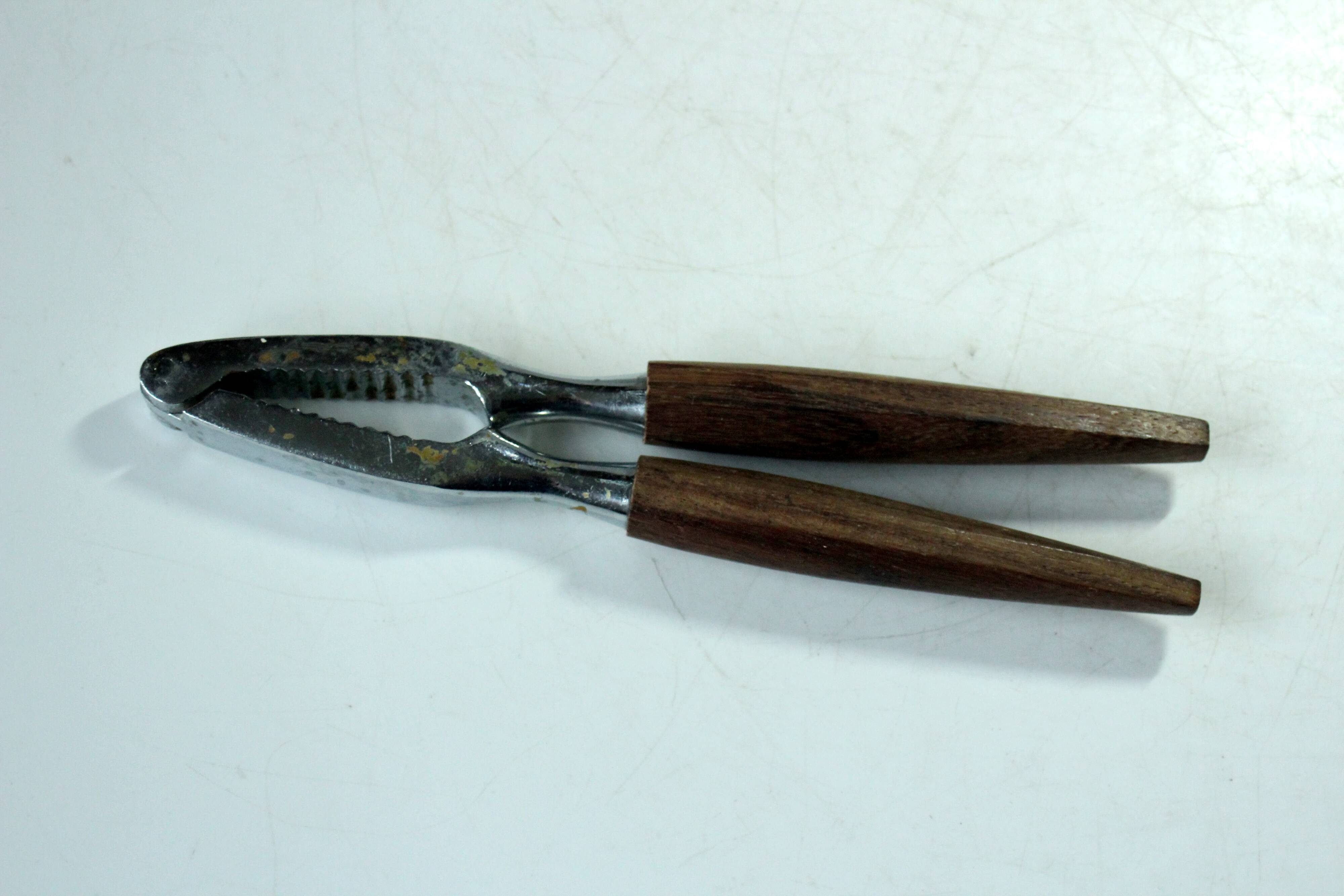 Handmade teak serving bowl with a nutcracker as a set, vintage from the 1960s