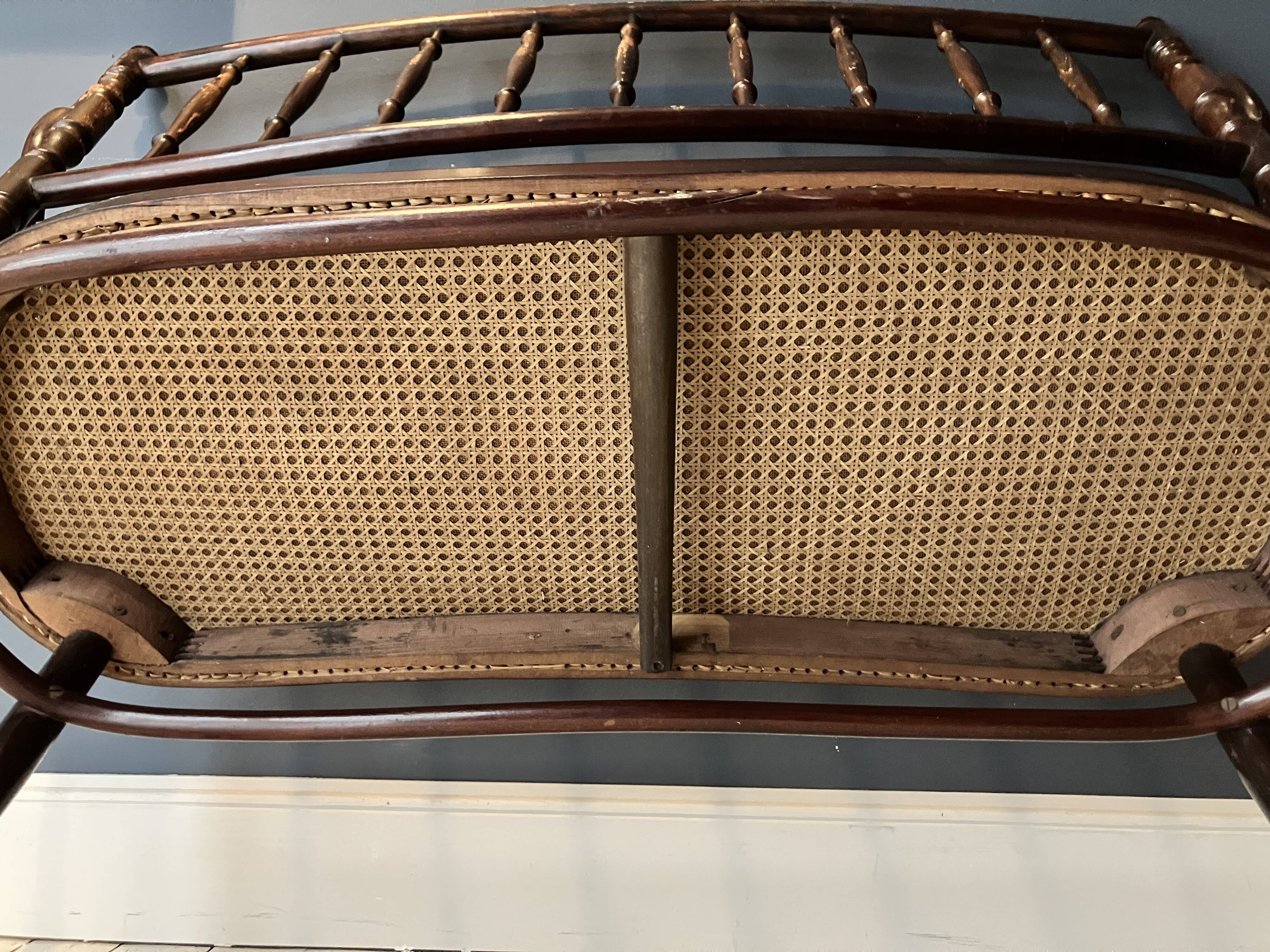 Thonet-branded bistro-style bench in turned wood, velvet and caning