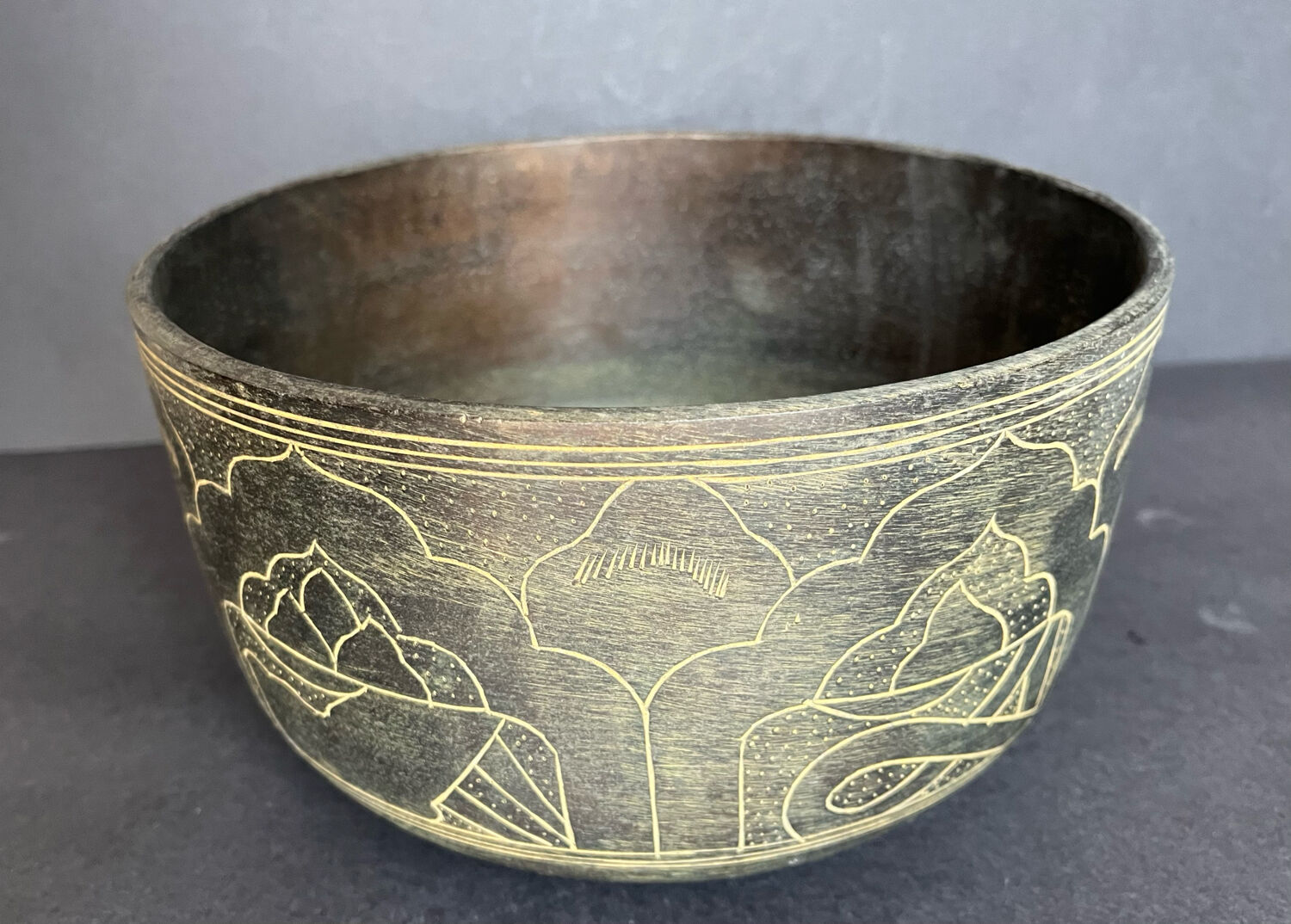 Carved bronze cup