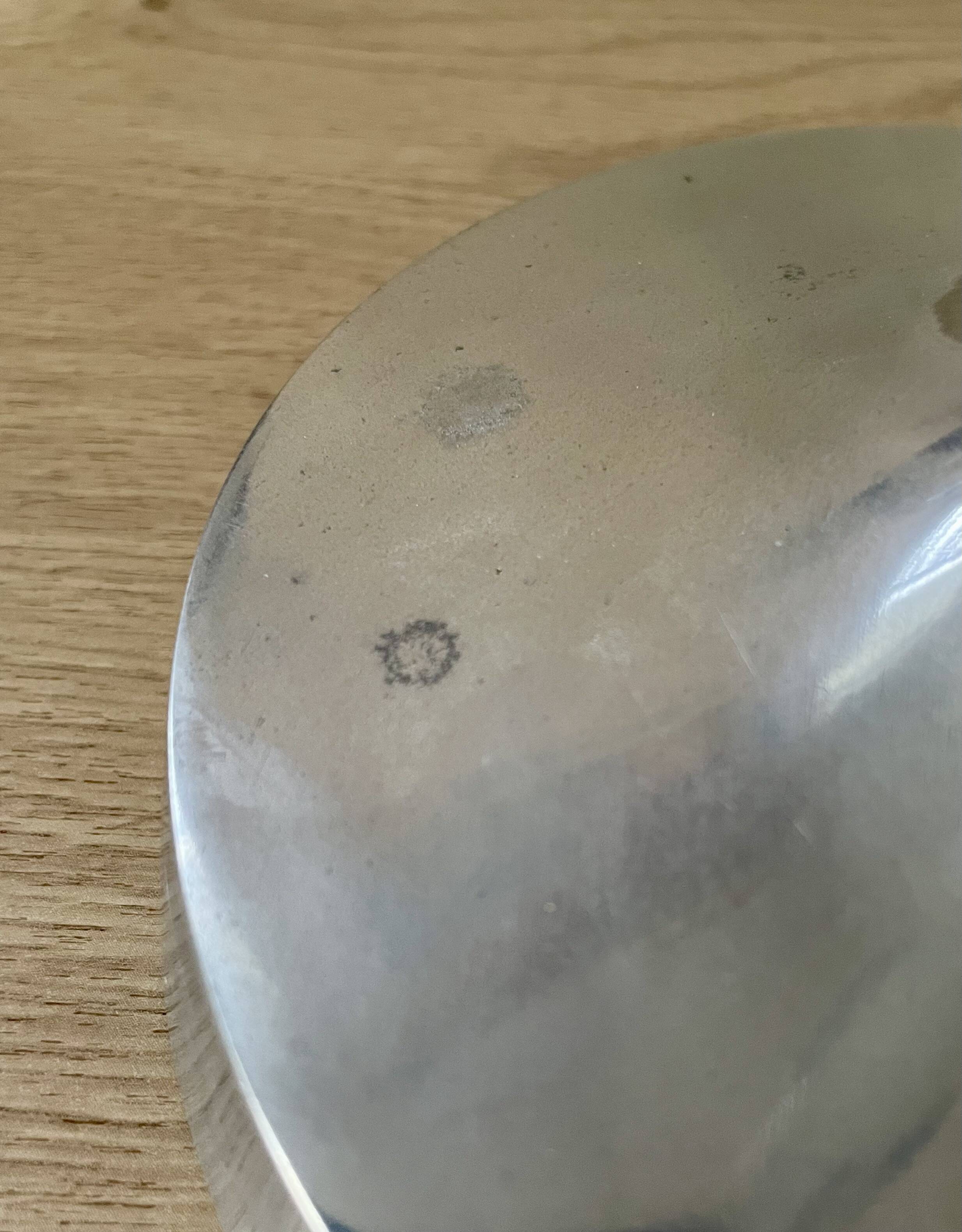 Pair of aluminium cast candle holders 52cm