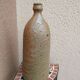 Sandstone bottle with inlaid fern décor by Alain Bernard Breton potter