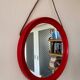 Mid-Century Scandinavian Red Round Wooden Mirror with Leather Strap, 1950s