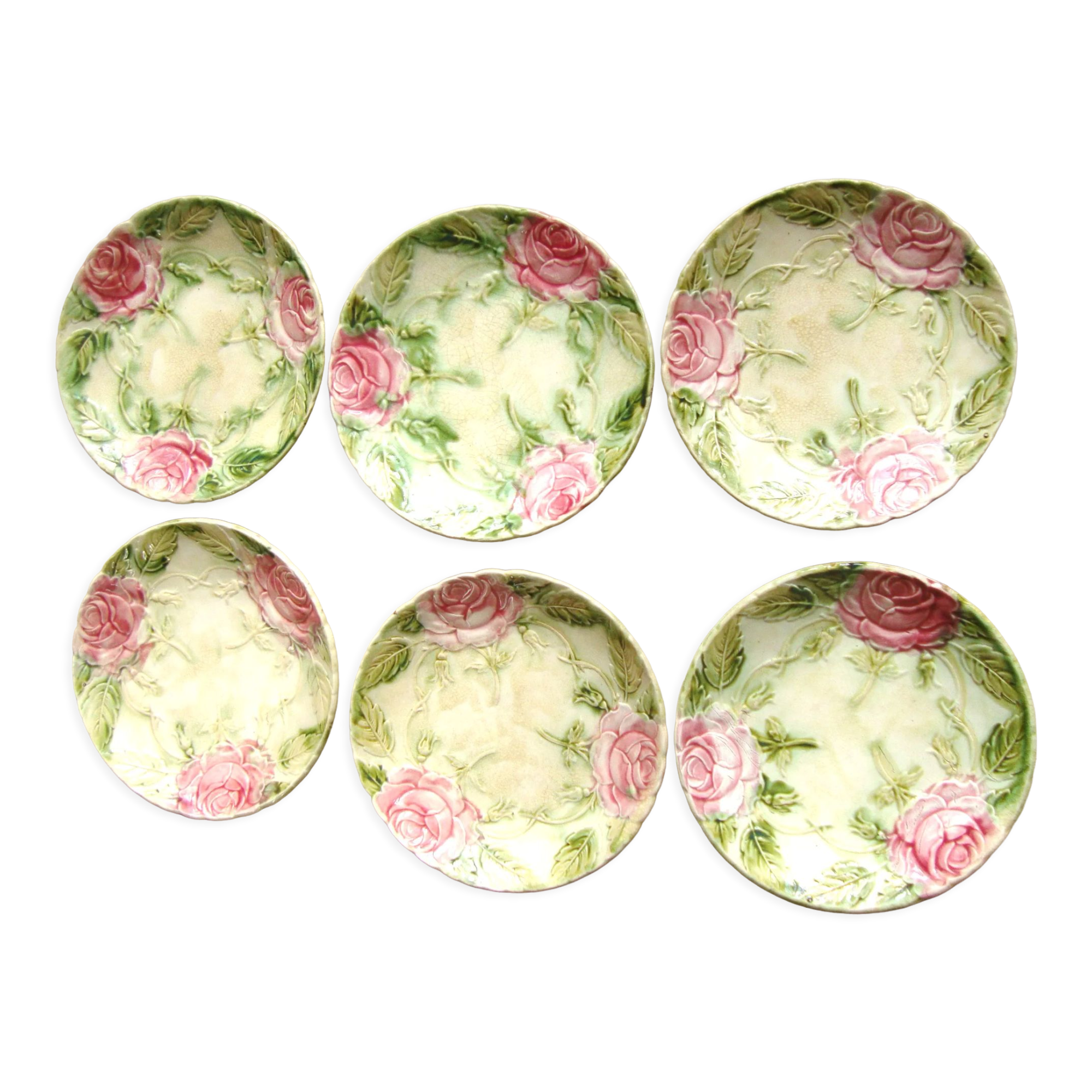 6 plates in slip decoration of roses earthenware of Onnaing