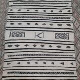 Traditional handmade white and black kilim carpet