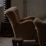 Pair of Danish Art Deco modern lounge chairs in sheepskin with lambswool and elm, 1940s.