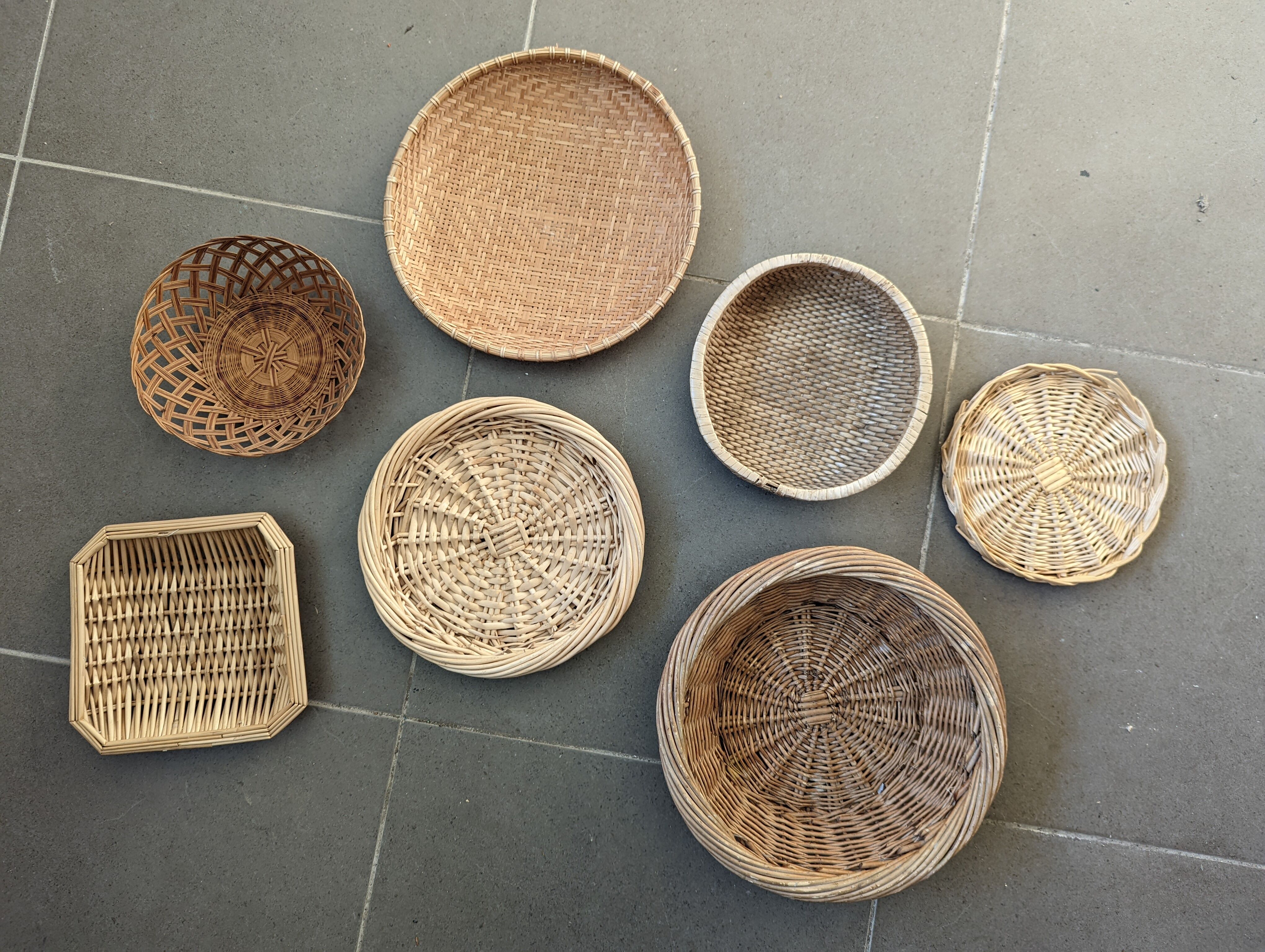 Wall composition of 7 wicker baskets