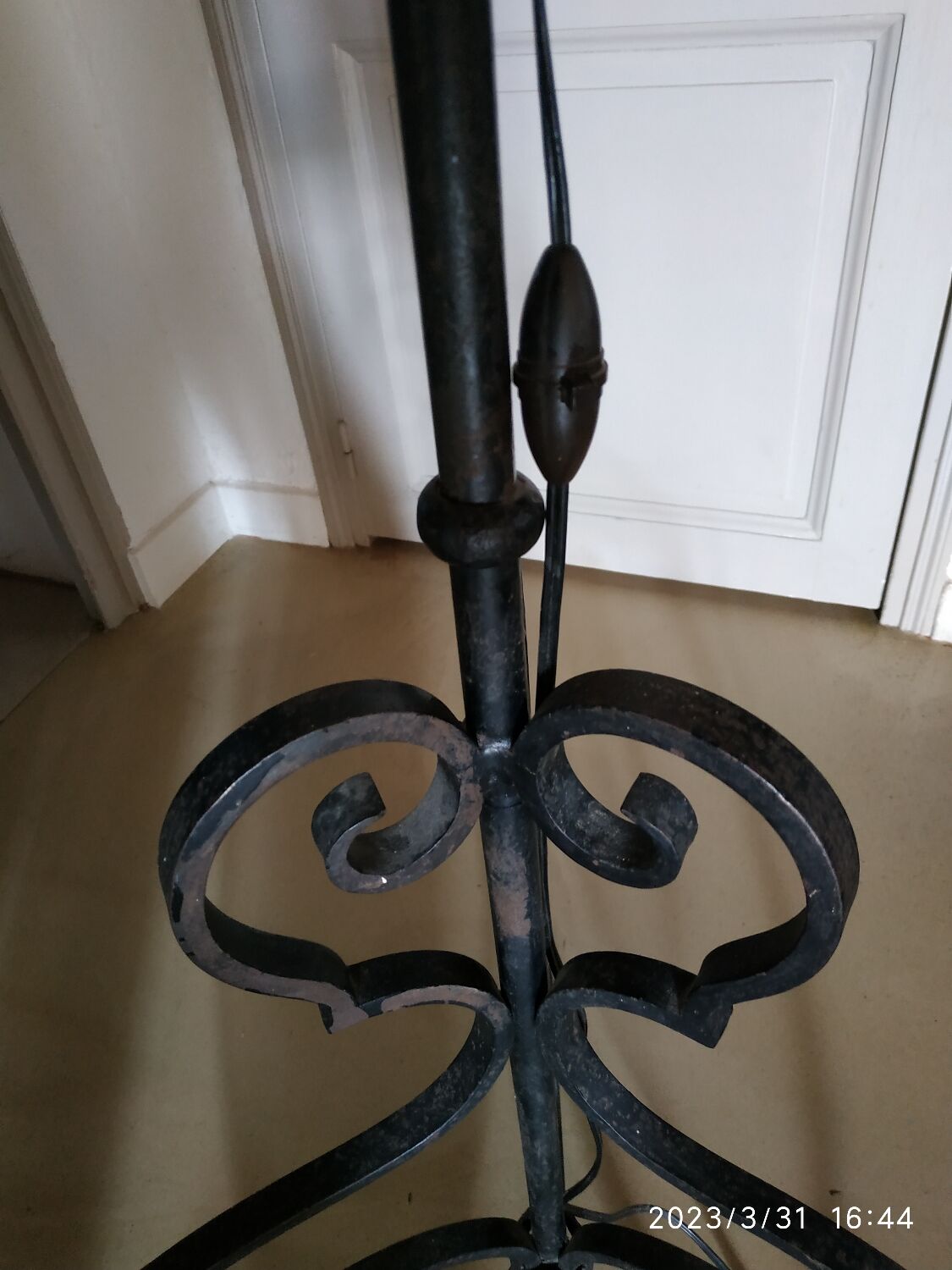 Black wrought iron floor lamp