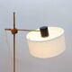 Floor lamp with a swivelling arm