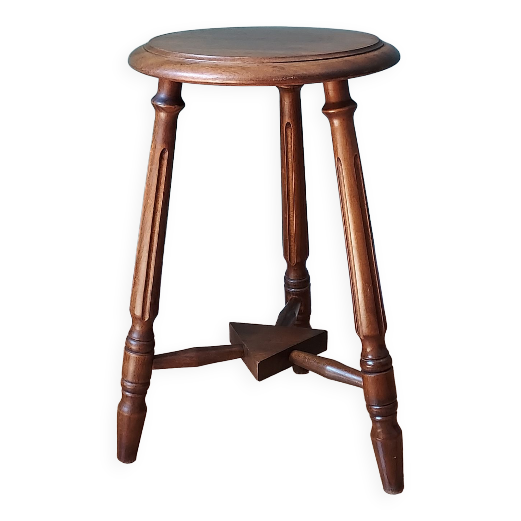 Carved tripod stool