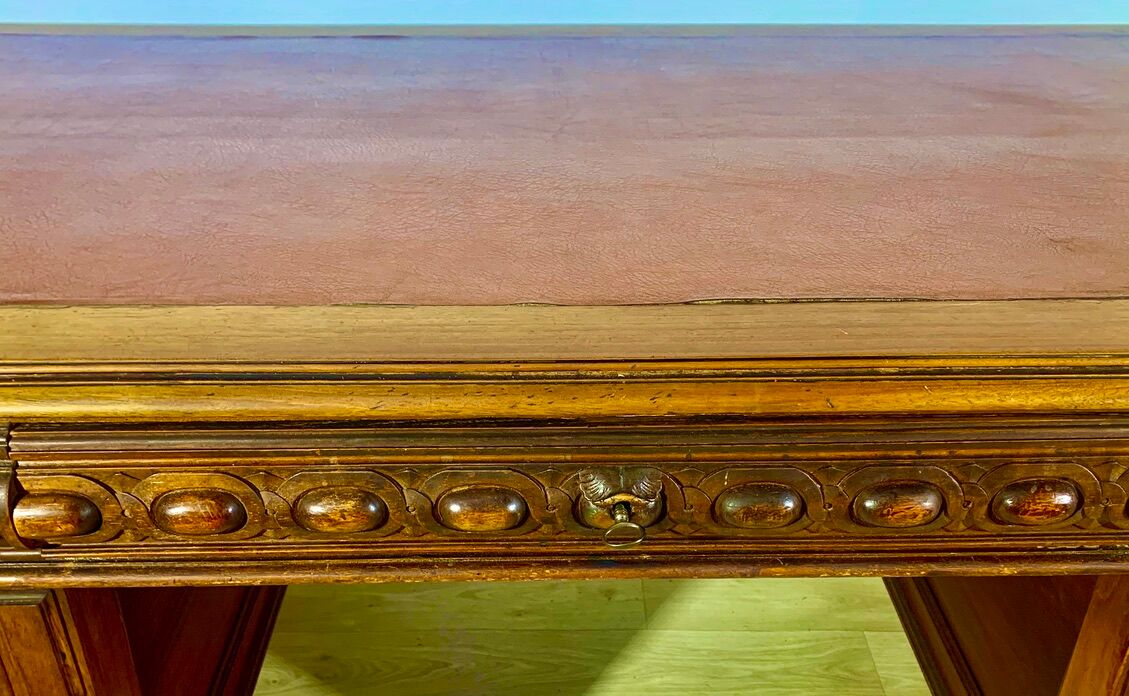 Renaissance style desk in solid oak, richly carved