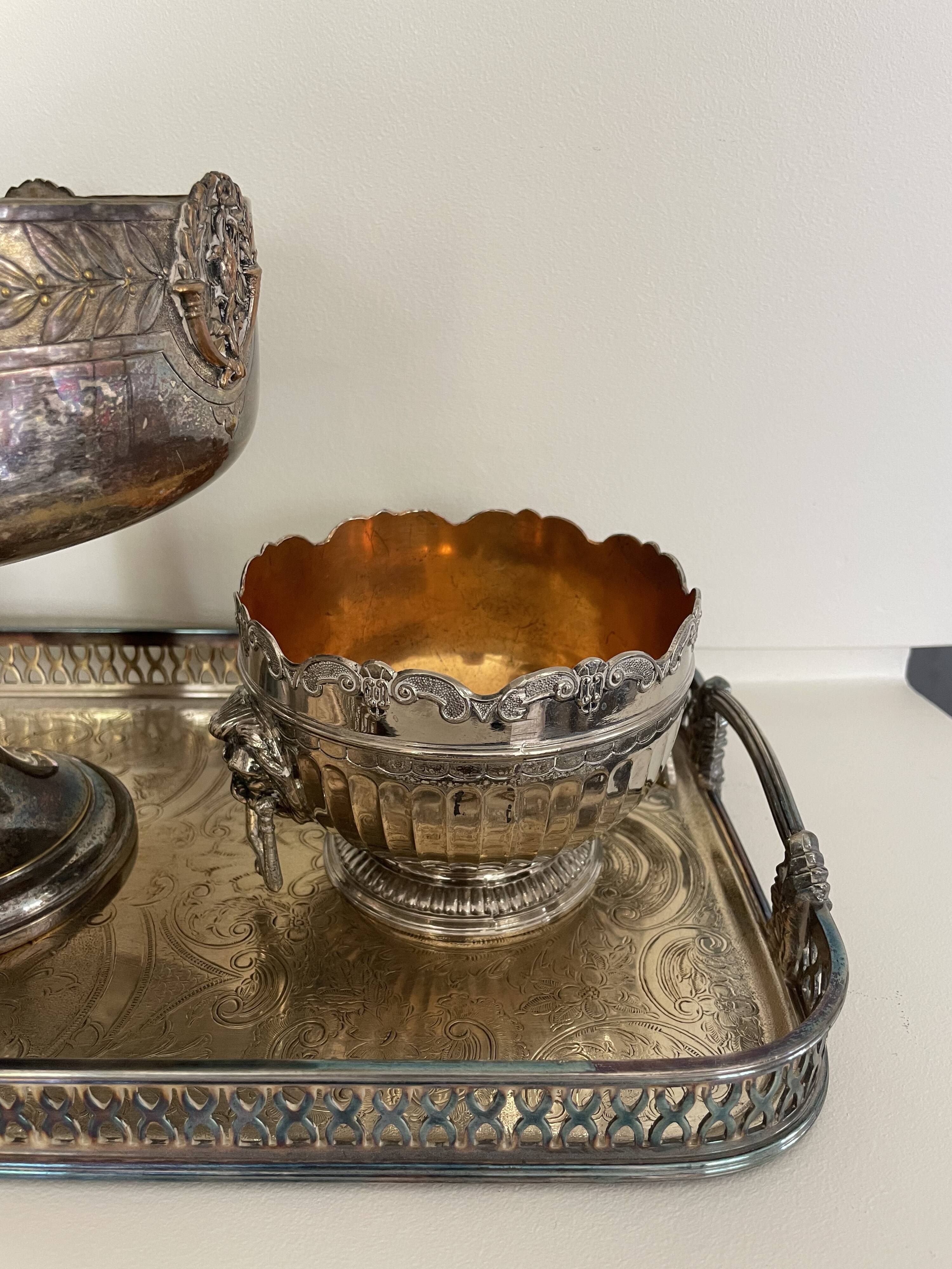 set of 3 silver metal chisel bowls with their tray