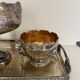 set of 3 silver metal chisel bowls with their tray