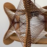 Hanging wood and stretched wire