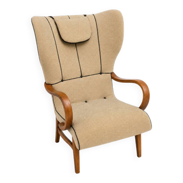 Swedish modern wingback chair, reupholstered with leather details, 1940/50s.
