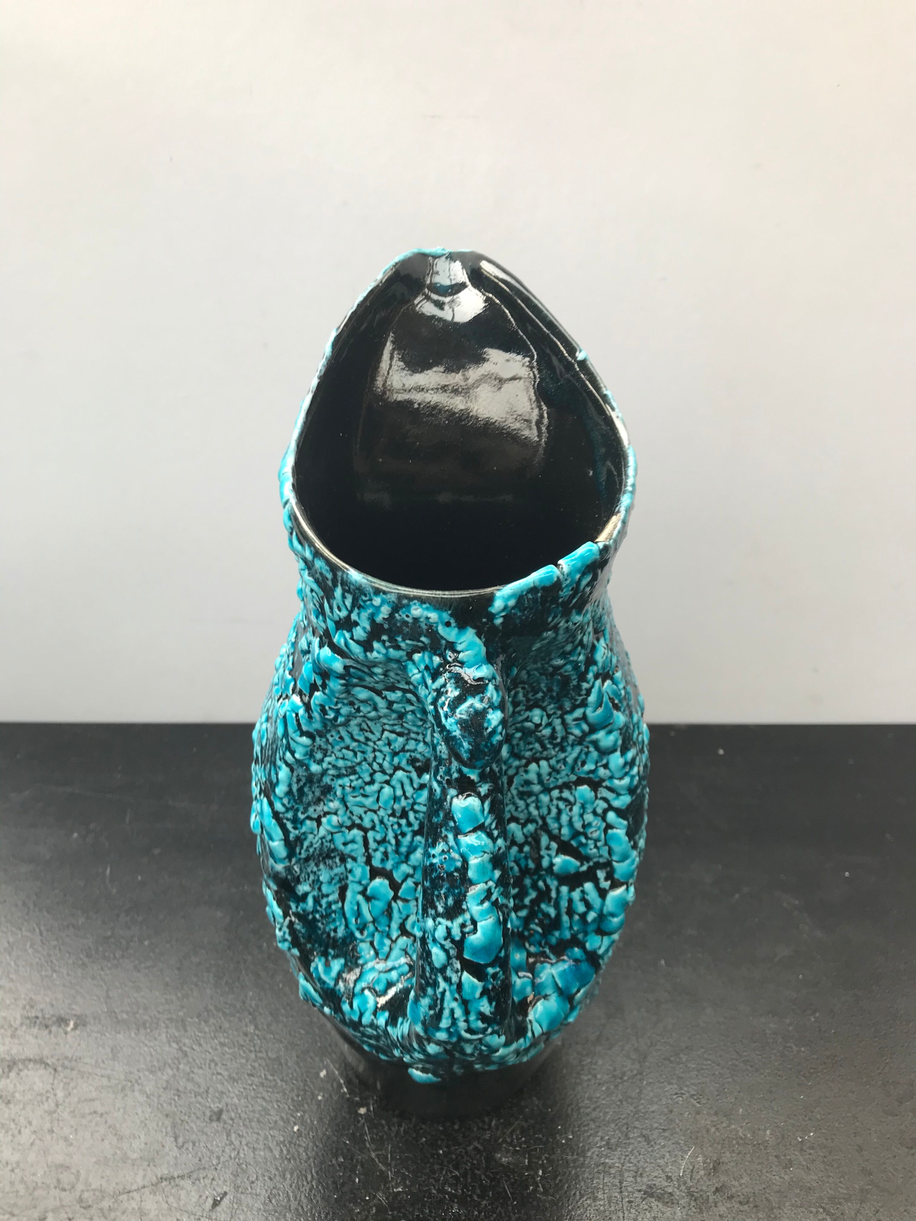 Former black ceramics pitcher