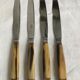 Twelve Art Deco horn and silver knives
