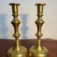 Pair of duo of ringed brass candlesticks