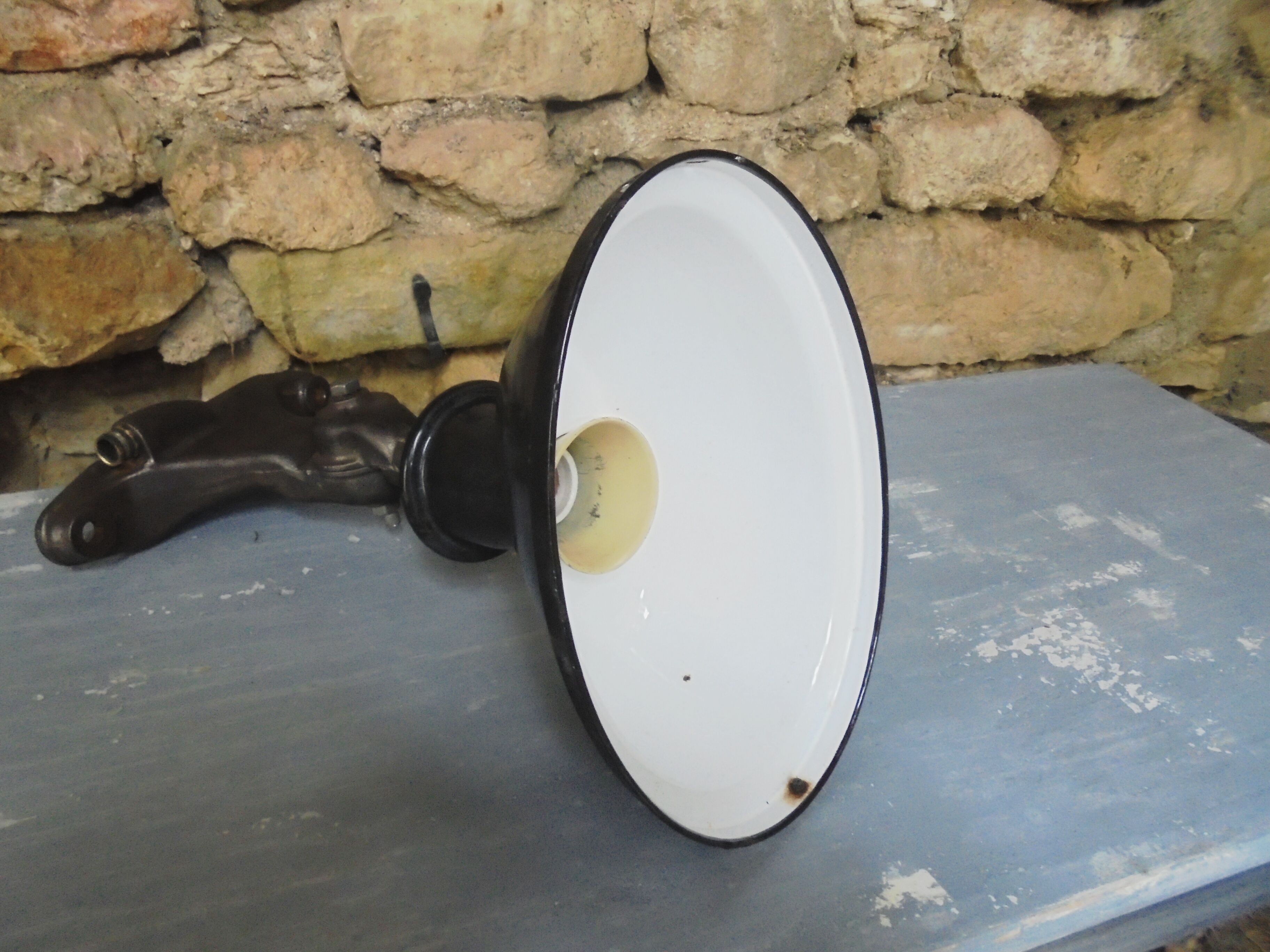 Antique cast iron and enamel wall lamp from the 1930s