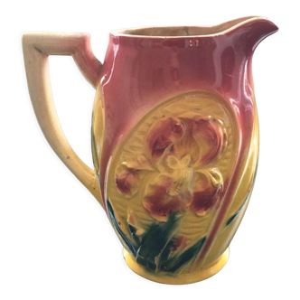 Old pitcher iris decoration in slip