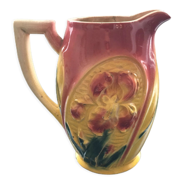 Old pitcher iris decoration in slip