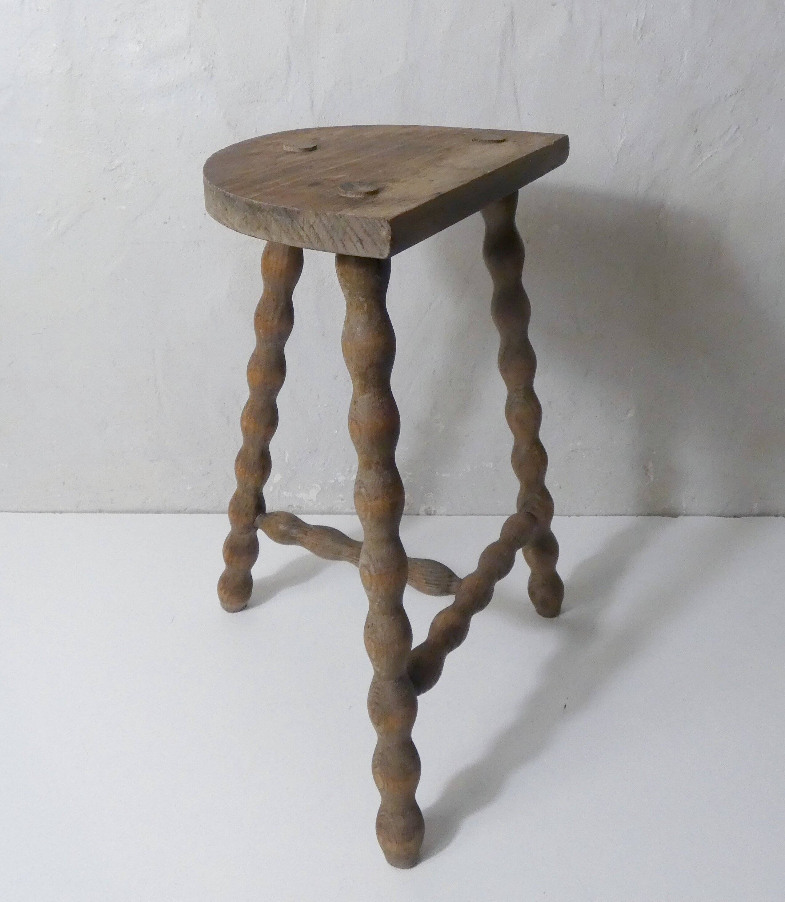 vintage half-moon tripod stool in turned solid wood with beaded edges
