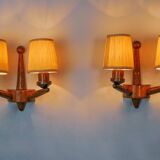 Pair of two-armed art deco "ball" wall lights, carved wood, France, 1960