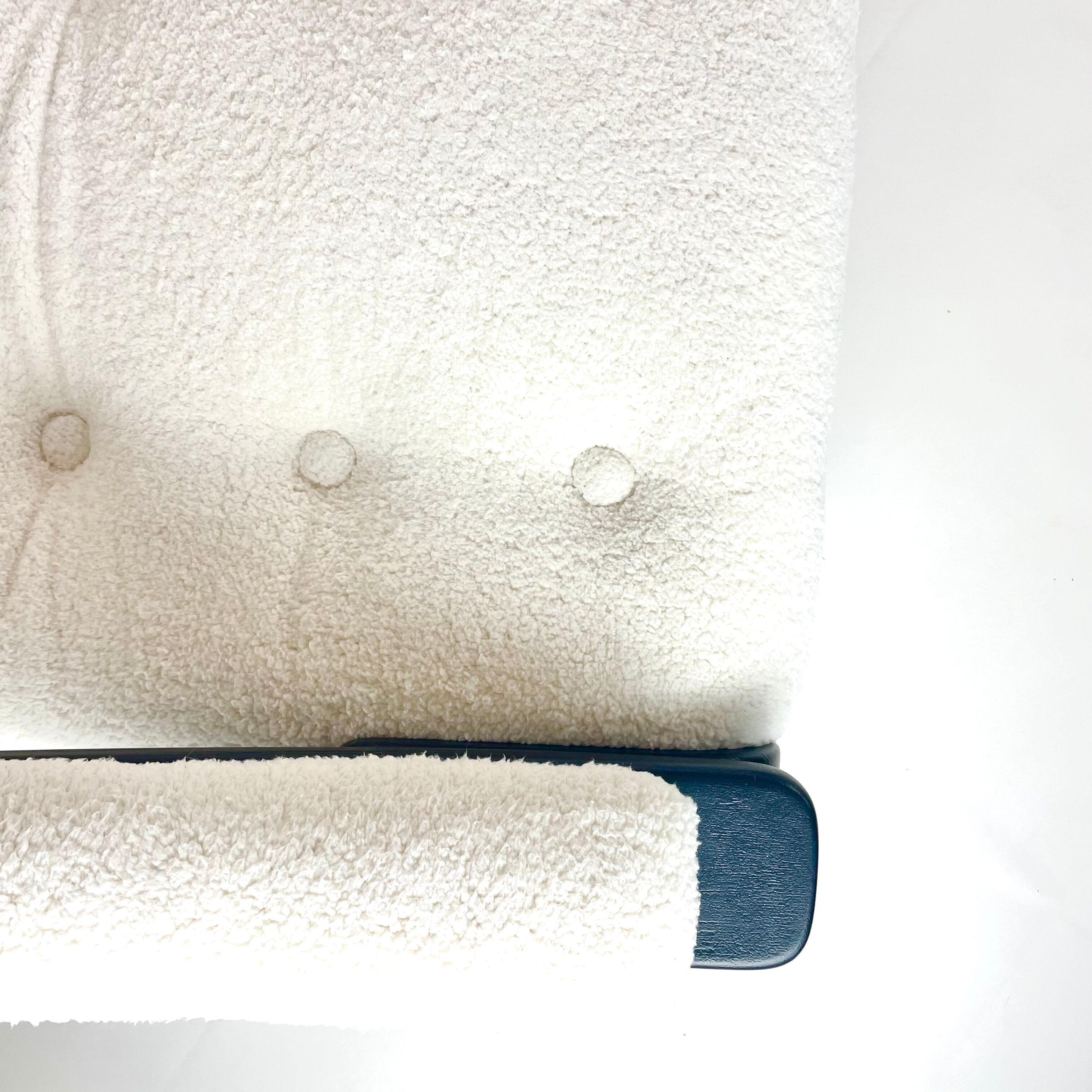 Three-seater sofa, removable cushions reupholstered in white teddy, circa 1970