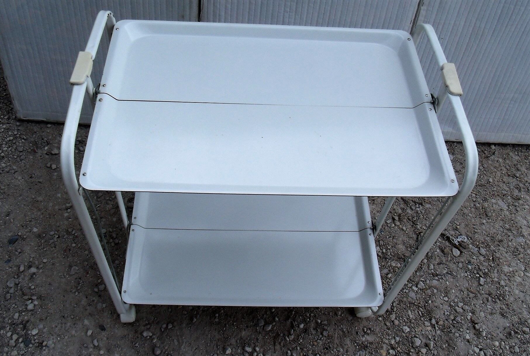 Serving white folding rolling table