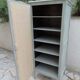 Re-enchanted vintage wardrobe in grey-green.