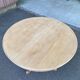 Extendable round dining table with central art deco leg, renovated in raw wood