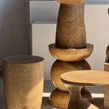 Natural solid mango side table (monoxyle) with conical legs.