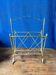 Neoclassical magazine rack in solid brass. Maison Jansen. 1940s.