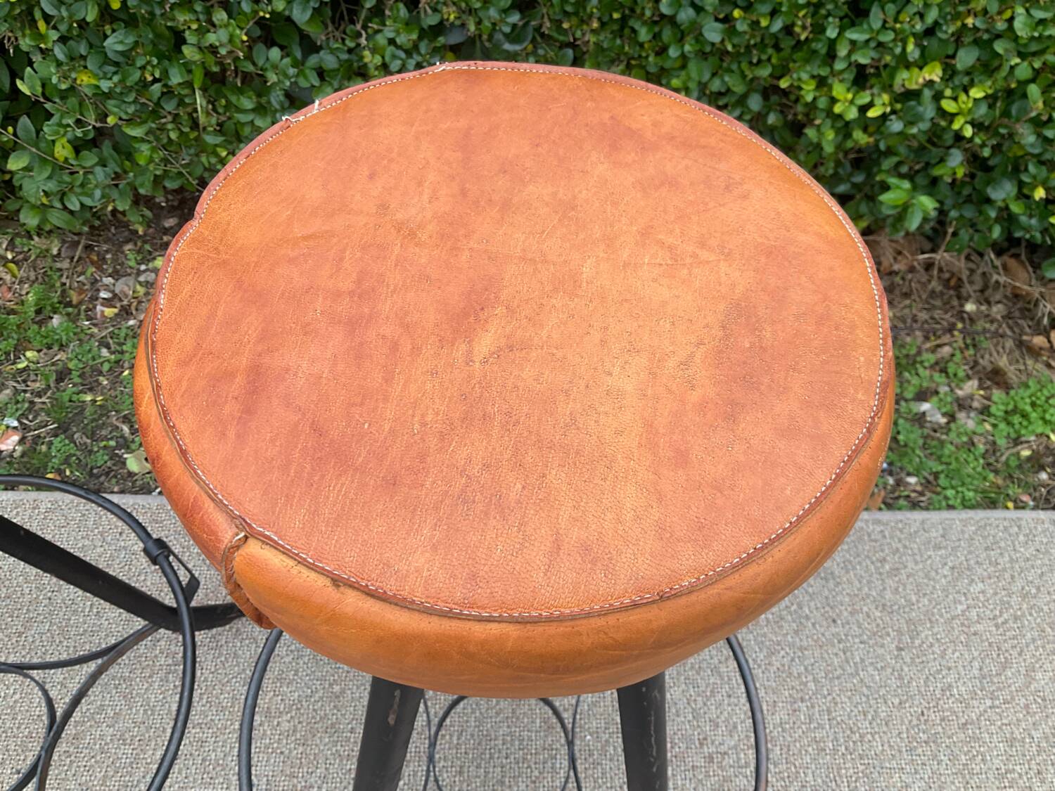 Pair of vintage metal and leather bar stools