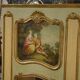Trumeau mirror with cracked patina and oil on panel depicting a romantic scene from the 19th century.