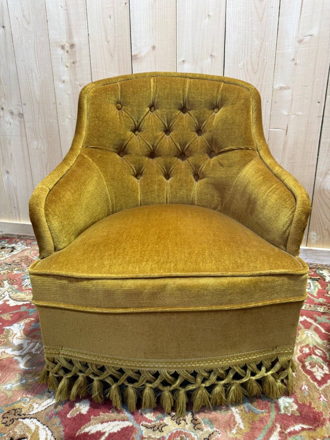 Pair of Napoleon III crapaud armchairs in mustard yellow velvet.