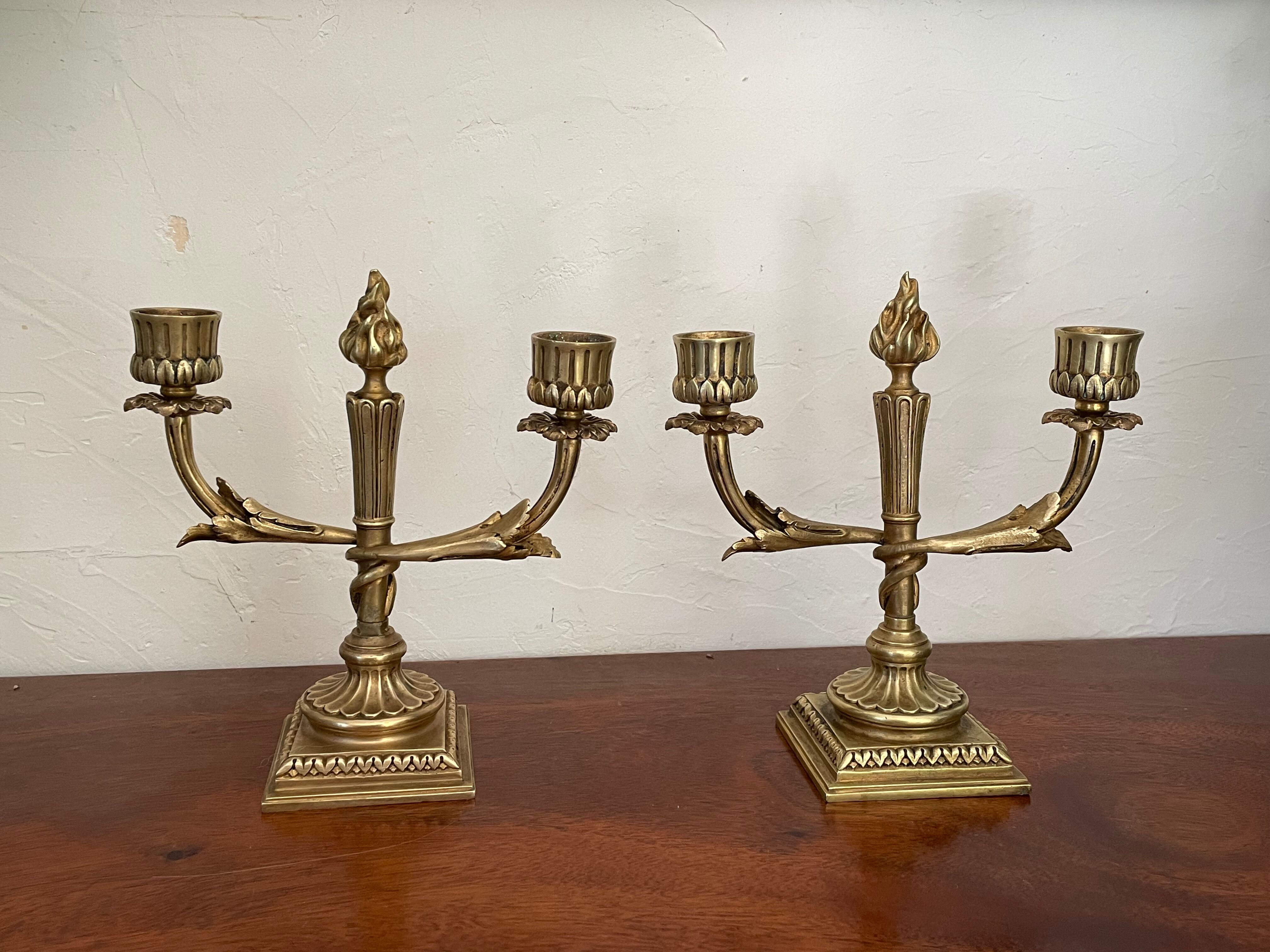 Pair of candle holders in gilded bronze nineteenth century