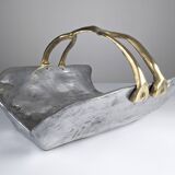 Firewood holder by David Marshall, 1980s